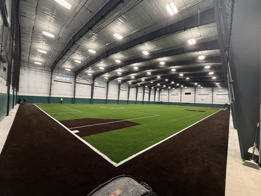 Indoor athletic training facility built inside a clear-span pre-engineered metal building